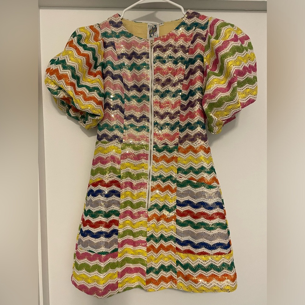 Such a fun dress from Queen of Sparkles! Beautiful puff sleeves and zip up front